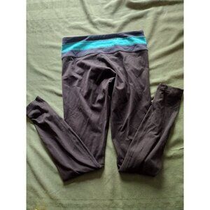 Lululemon Black leggings with blue band. Size 8